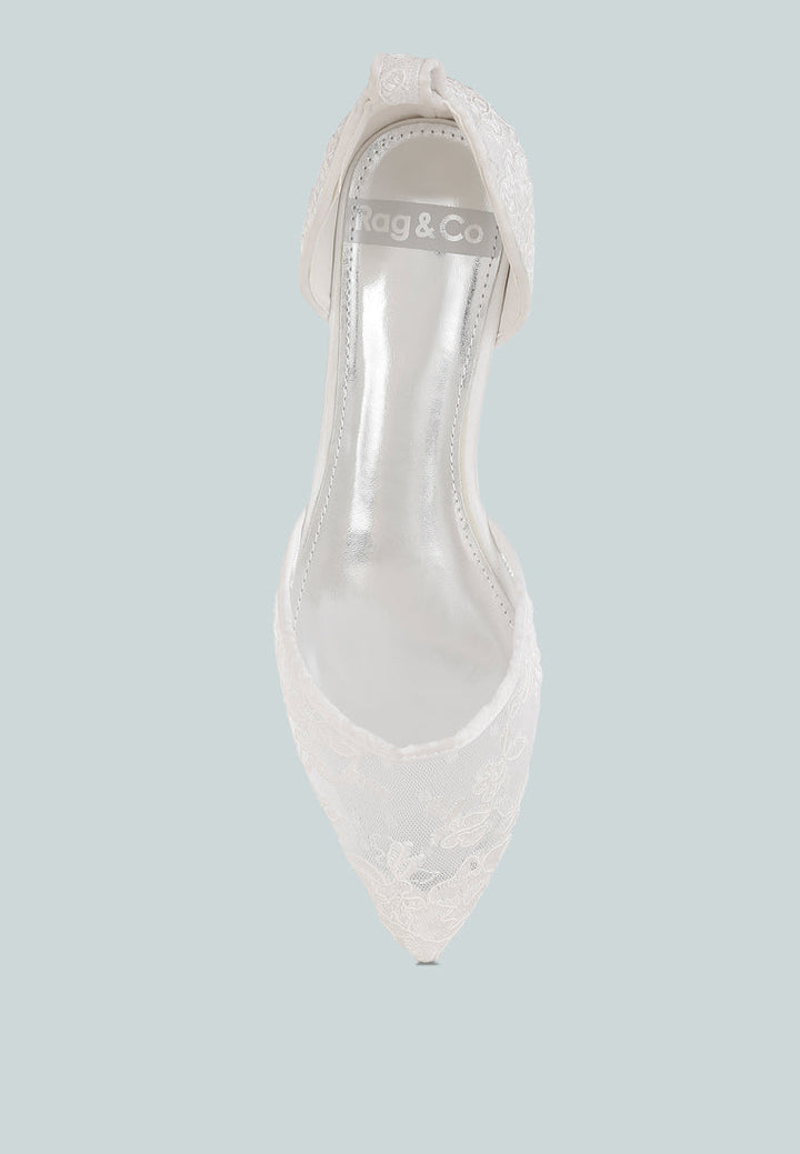 sandalias planas con tira de perlas y strass de shrami#color_white