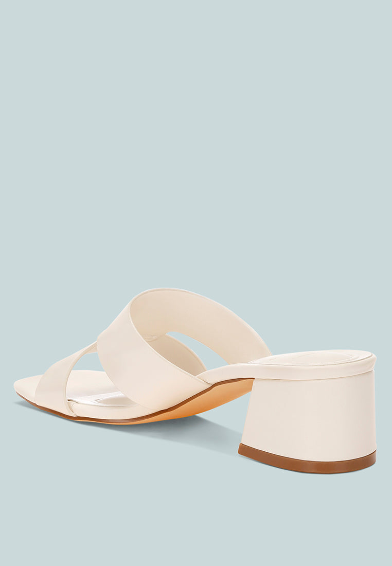 shulva block heel slip ons by motes#color_off-white