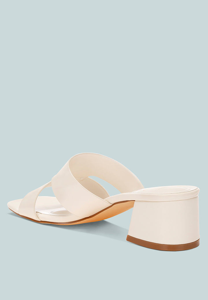 shulva block heel slip ons by motes#color_off-white