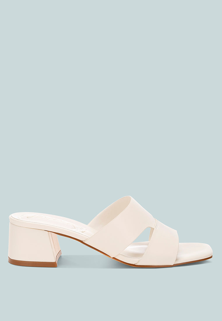 shulva block heel slip ons by motes#color_off-white