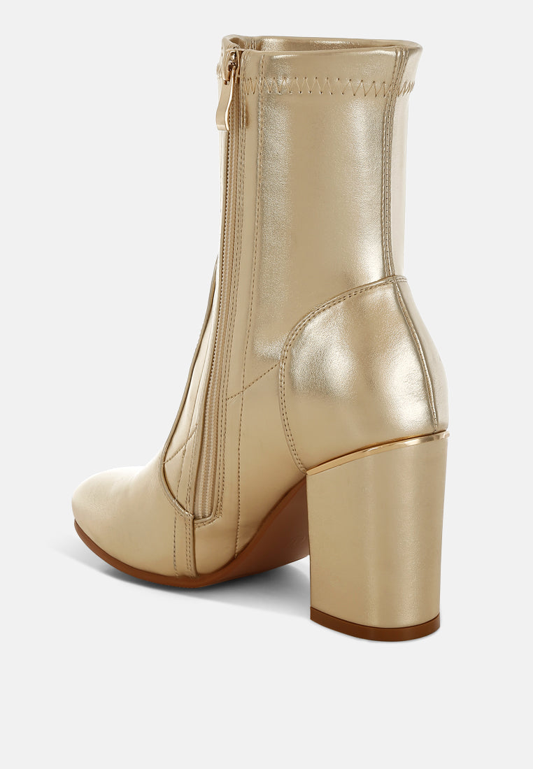 Botas tipo calcetín de piel sintética tirana#color_gold