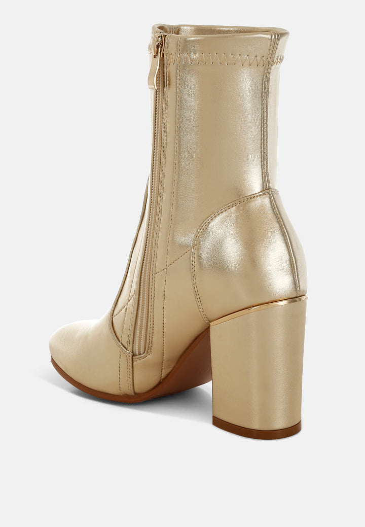 Botas tipo calcetín de piel sintética tirana#color_gold