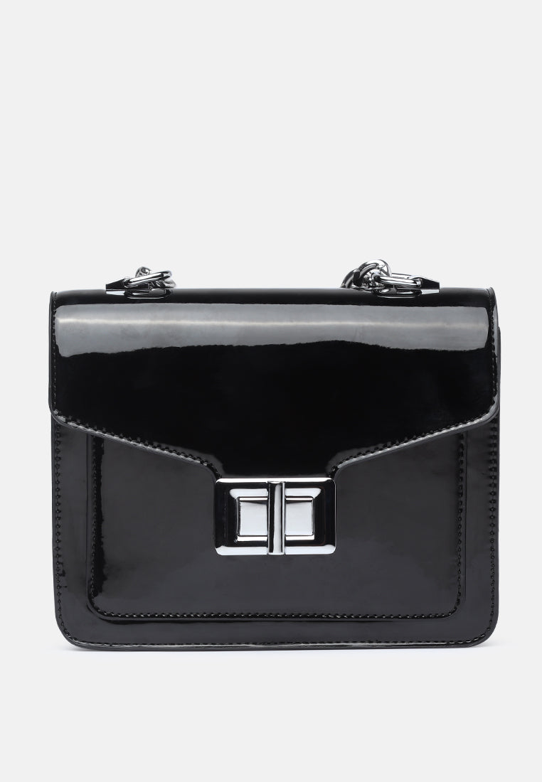 classic sling bag with twist and lock closure#color_black