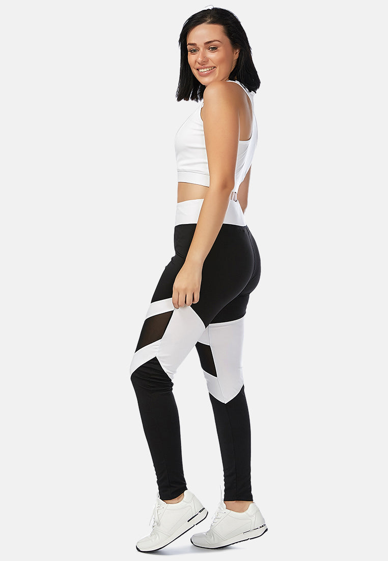 geometric paneled mesh yoga leggings#color_black