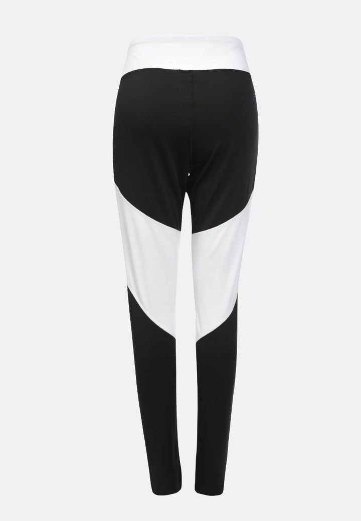 geometric paneled mesh yoga leggings#color_black