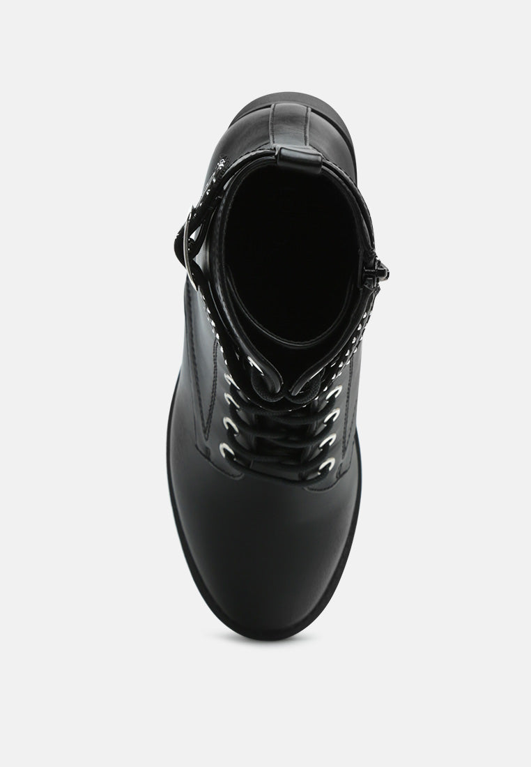 hudson solid tone combat studded high ankle boots#color_black