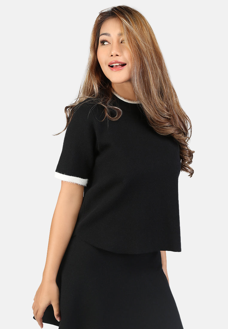 knit top with contrast neck and sleeve rib#color_black