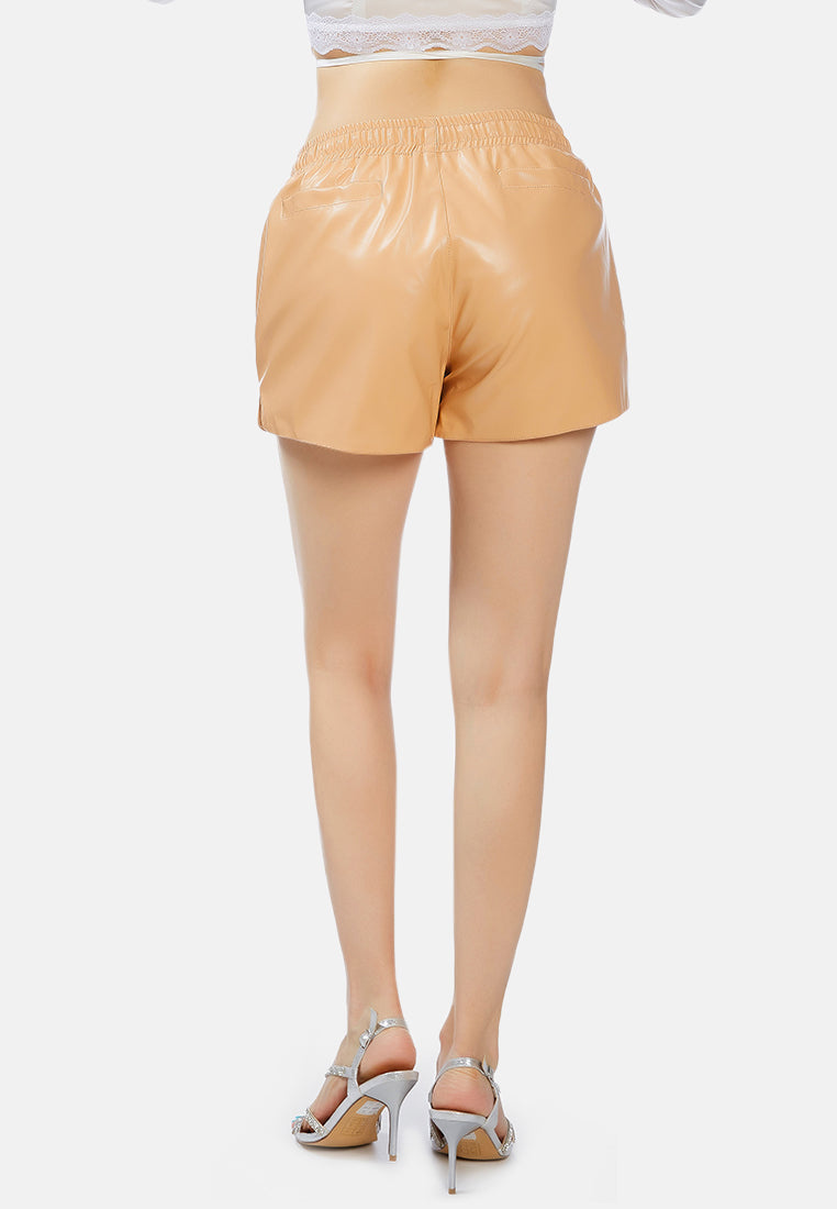 metallic faux leather drawstring shorts#color_tan