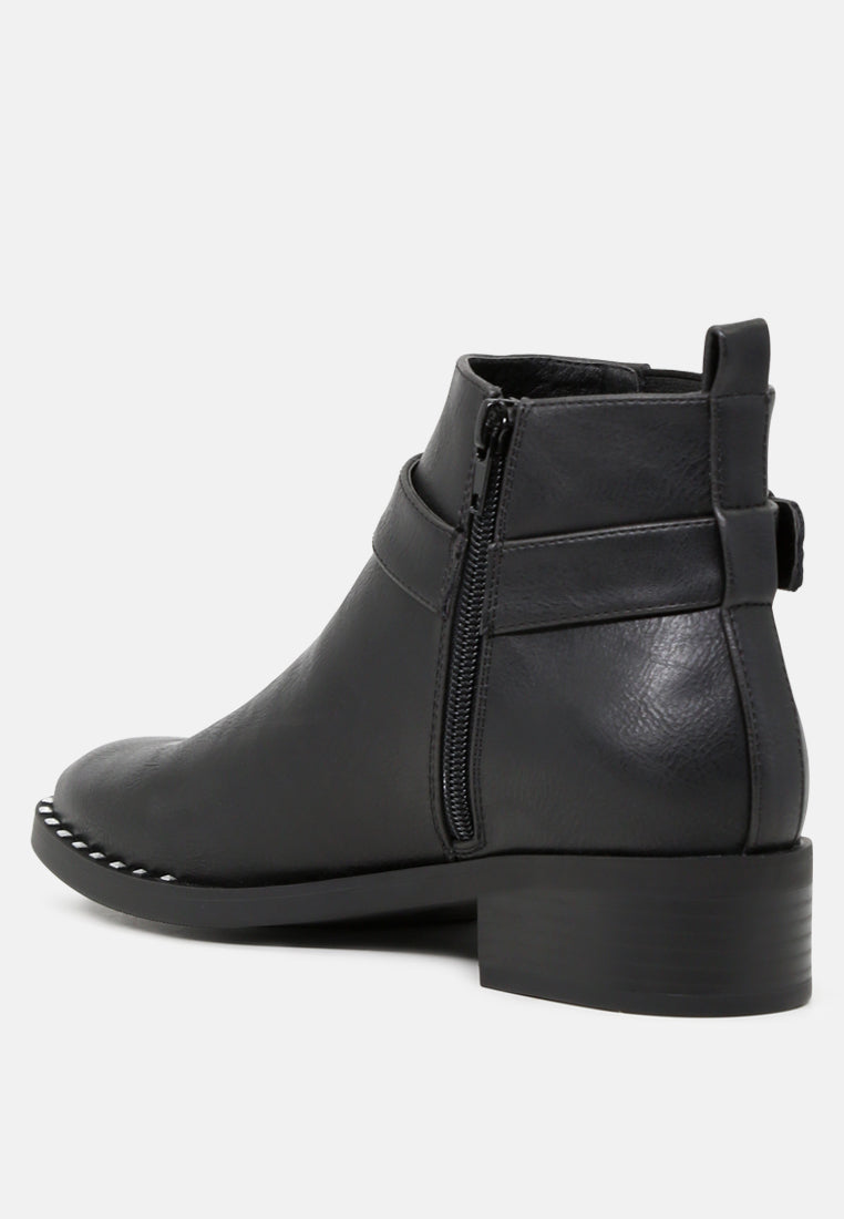 nia ankle length boots with gold rim#color_black