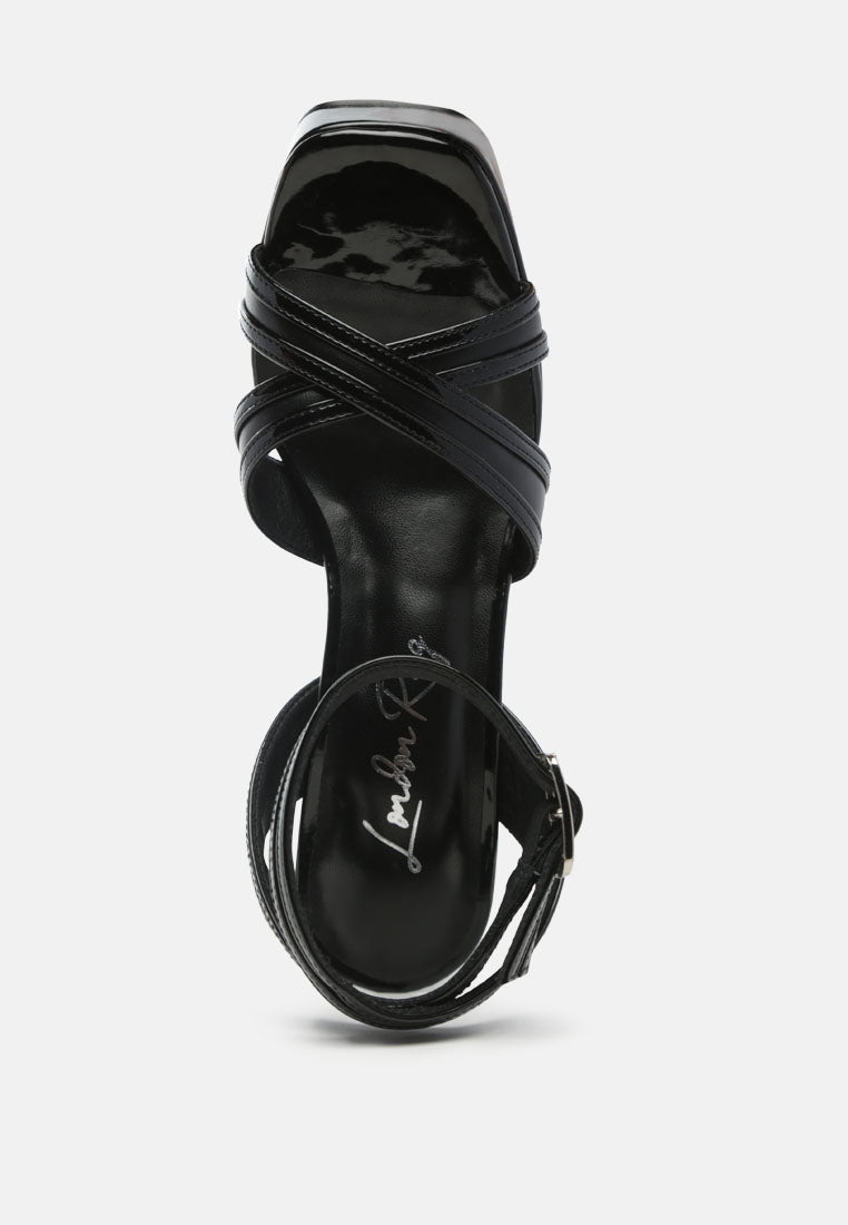 nyle platform heeled sandals#color_black