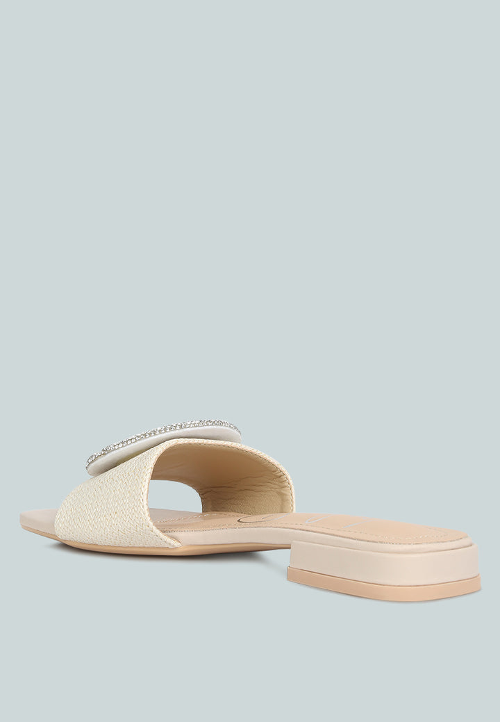 ollilie rhinestones embellished brooch slip on sandals#color_off-white