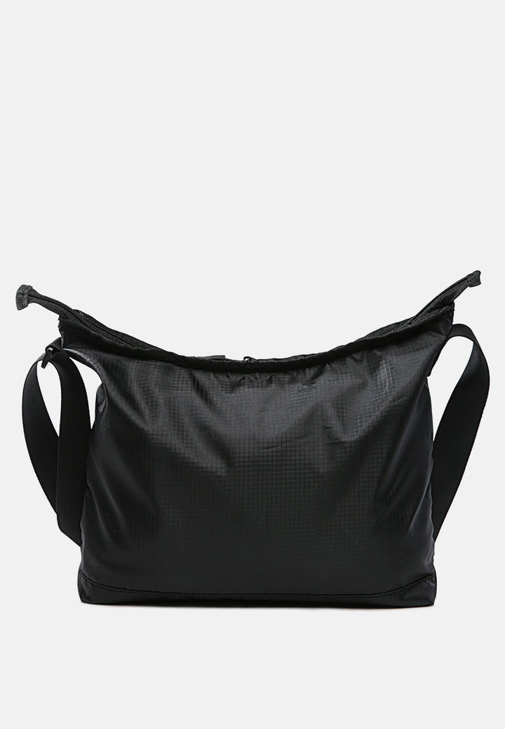 on the move cross body bag#color_black 