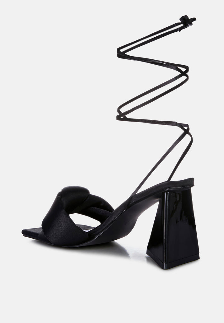 pristine knotted satin strap triangular block heel sandals#color_black