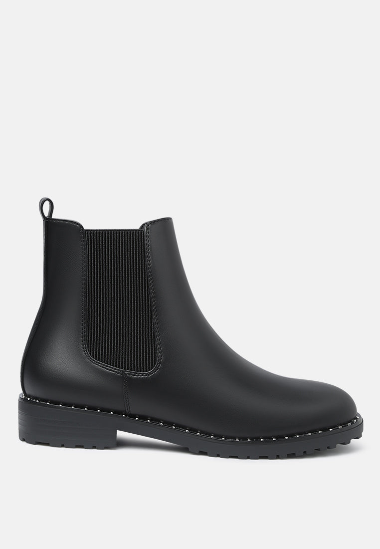 riri studded solid tone chelsea boots#color_black
