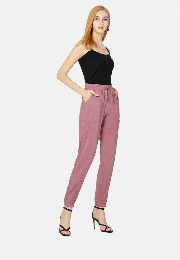 solid trousers with drawstring#color_purple