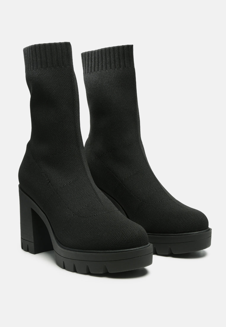 zinnia knitted block heeled boots#color_black
