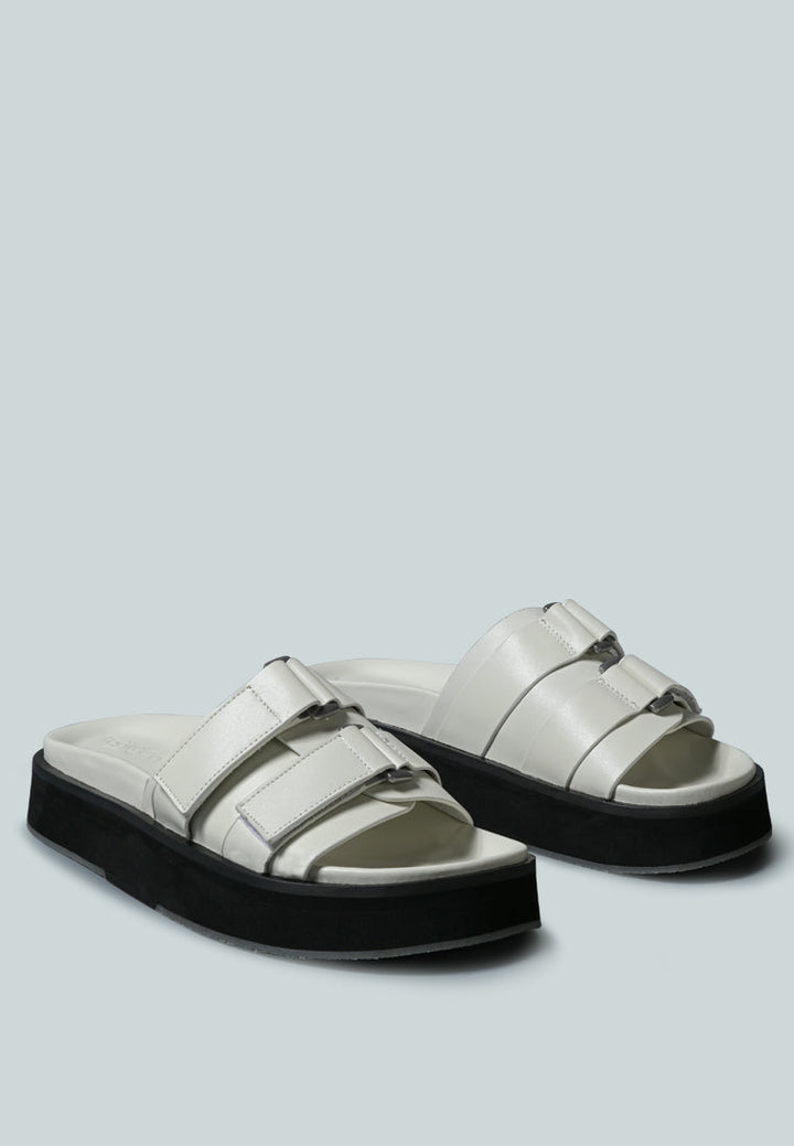aniston buckled flatform slip-on sandal by ruw#color_white
