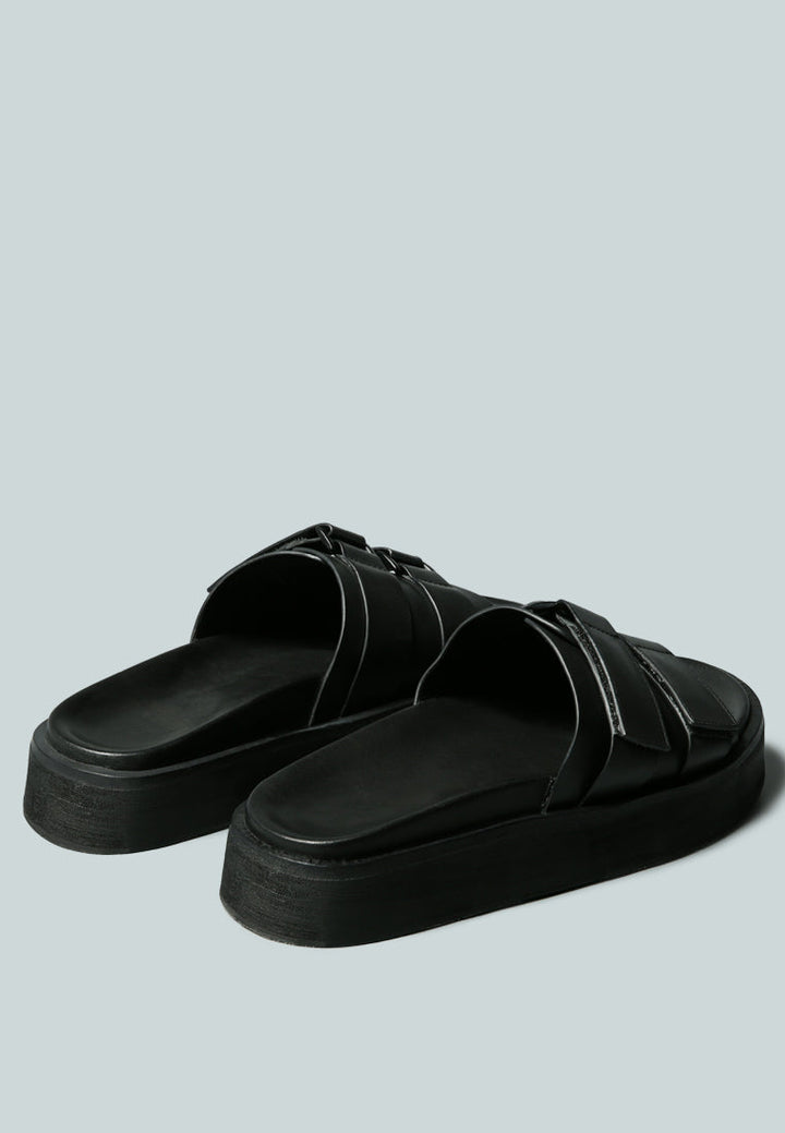 aniston buckled flatform slip-on sandal by ruw#color_black