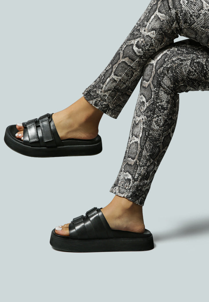 aniston buckled flatform slip-on sandal by ruw#color_black