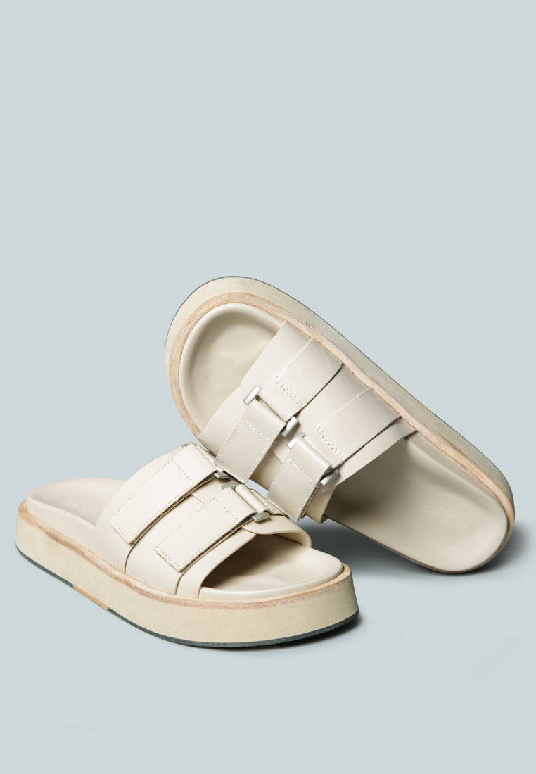 aniston buckled flatform slip-on sandal by ruw#color_nude