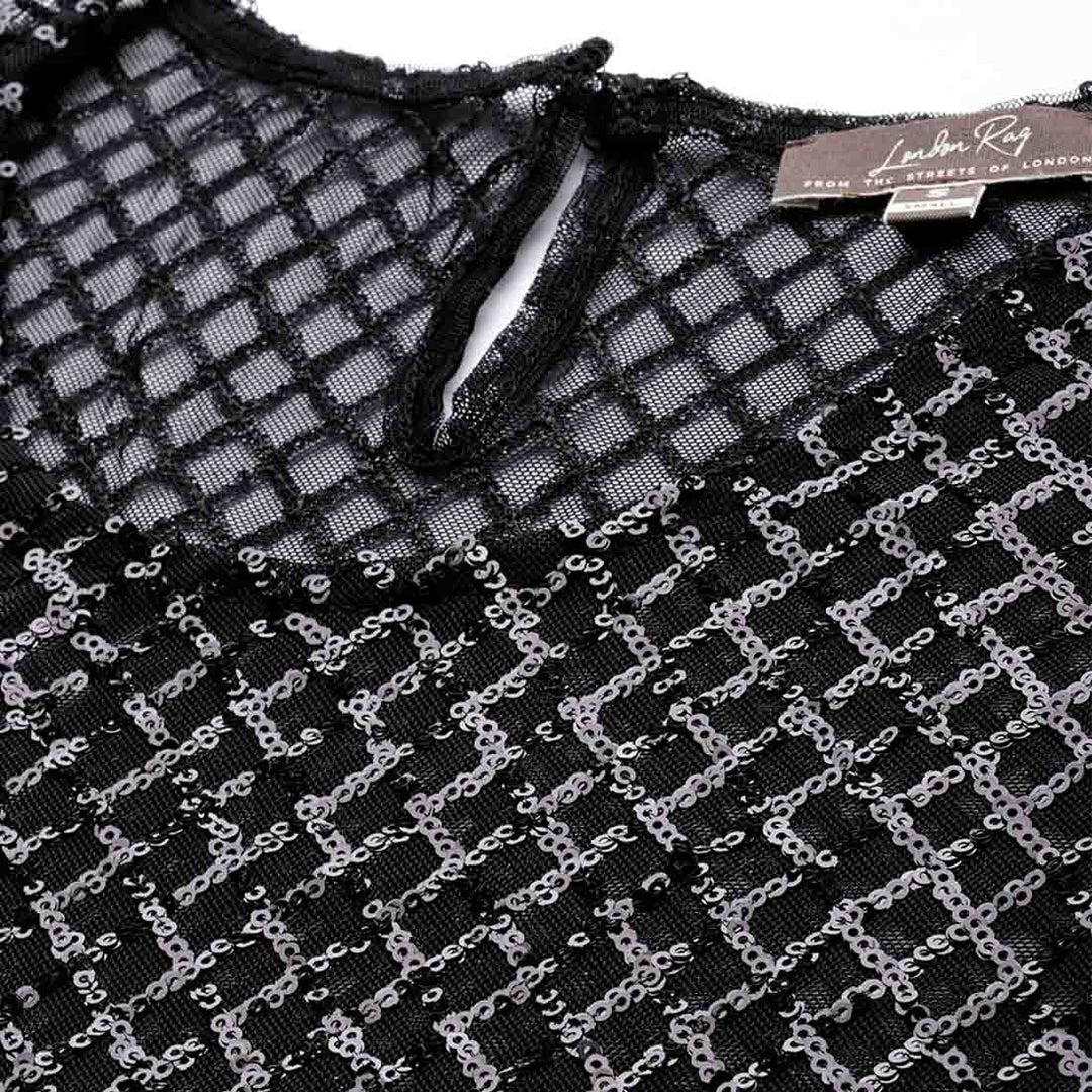 sheer sequin long sleeve top in black#color_black