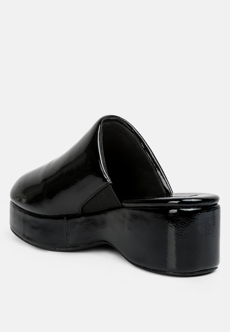 olori solid platform slip on mules by ruw#color_black