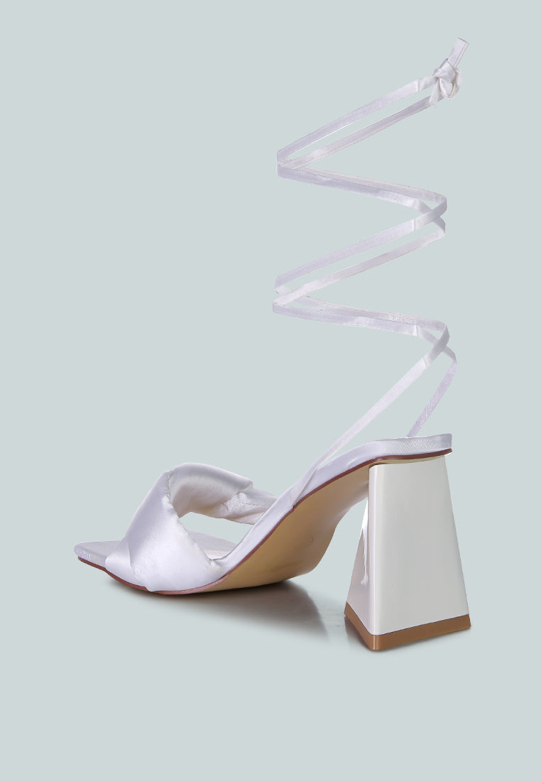 pristine knotted satin strap triangular block heel sandals#color_white