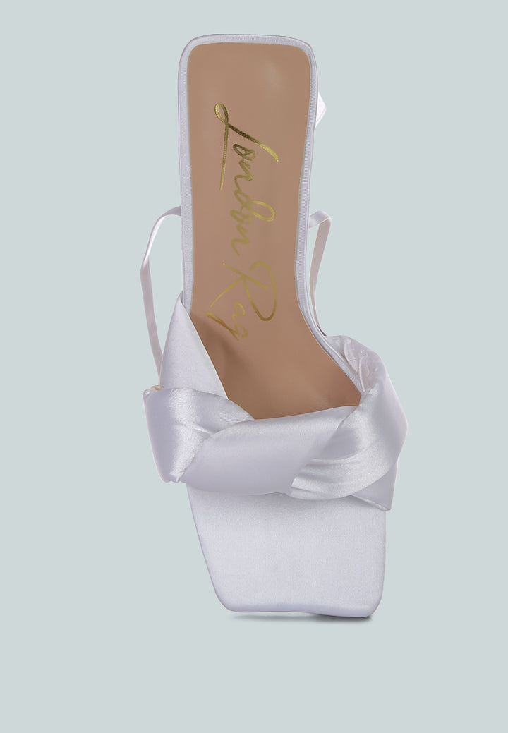 pristine knotted satin strap triangular block heel sandals#color_white