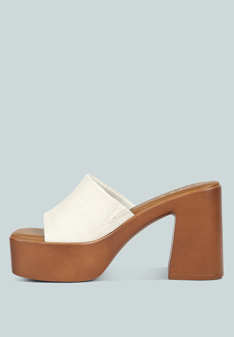 scandal slip on block heel sandals#color_off-white