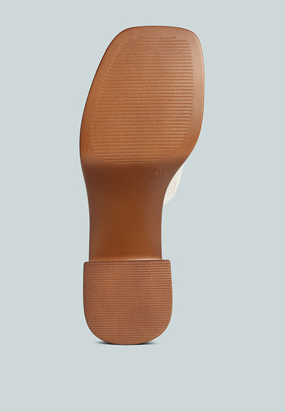 scandal slip on block heel sandals#color_off-white